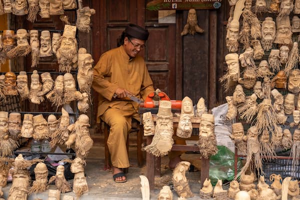 Local artisans creating traditional crafts in Ubud