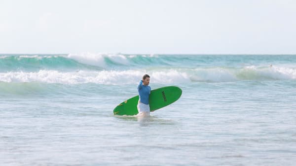 Surfer in uluwatu beach
